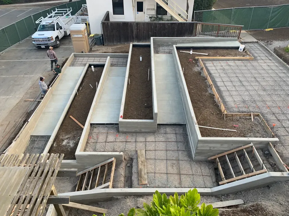 ADA accessible ramp with board formed concrete walls in Cal Poly, San Luis Obispo, CA