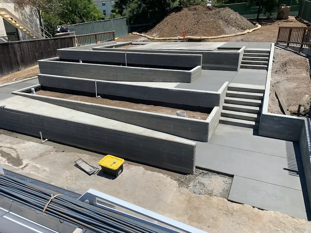 ADA accessible ramp with board formed concrete walls in Cal Poly, San Luis Obispo, CA