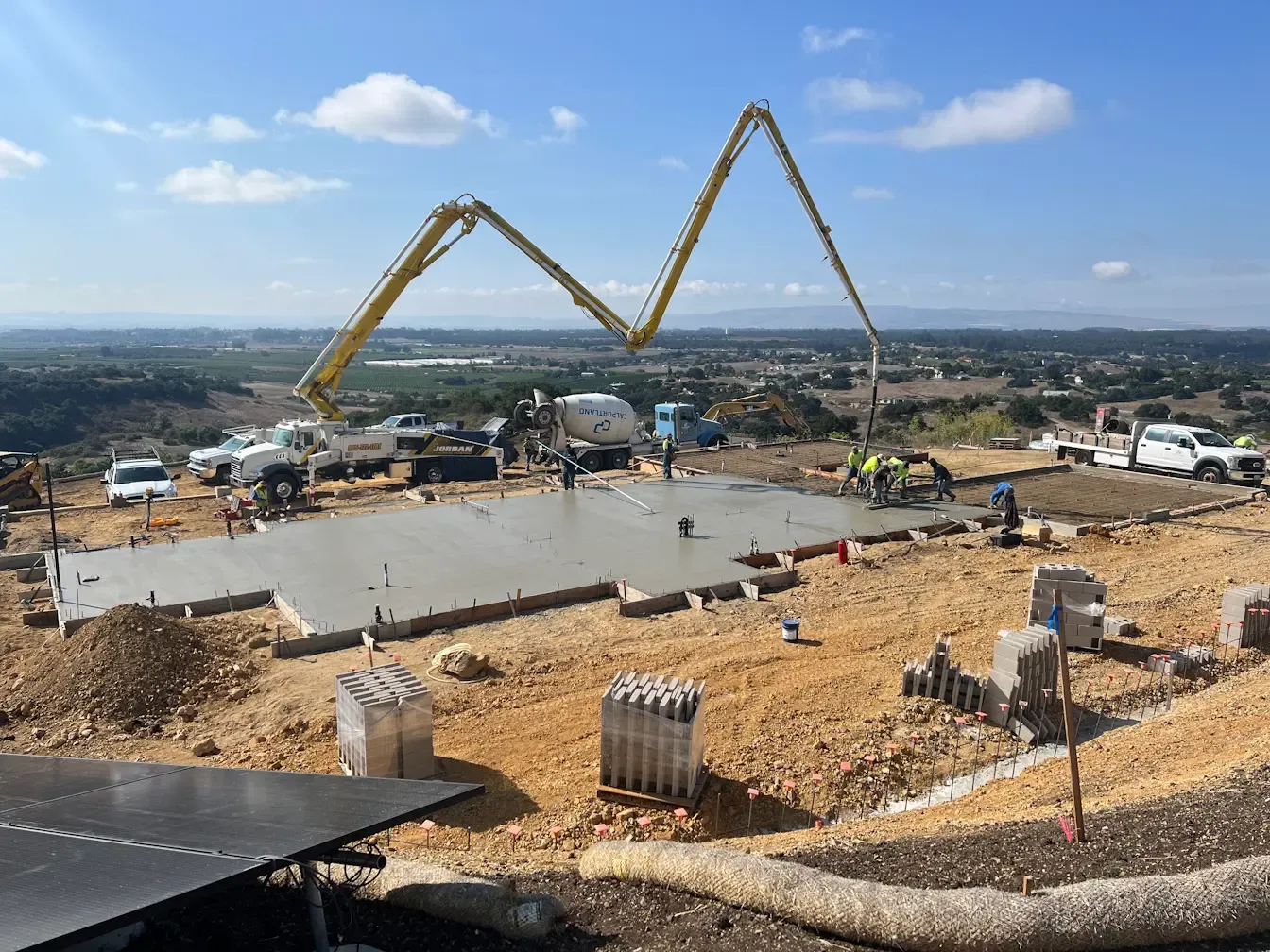 Commercial concrete slab on grade and foundation construction for business facilities